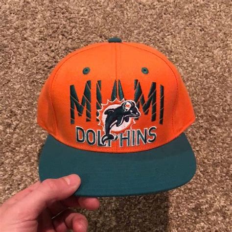 Miami Dolphins Throwback Logo Snapback Hat | Snapback hats, Clothes ...