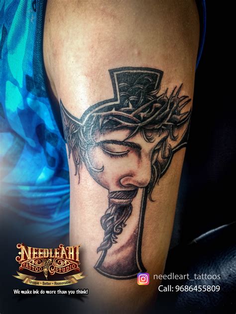 Jesus face inside cross portrait tattoo design NeedleArt Tattoo Studio ...