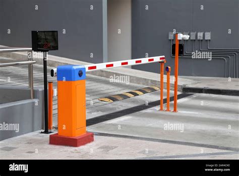 Automatic barrier gate with RFID Card dispenser system for car parking Stock Photo - Alamy