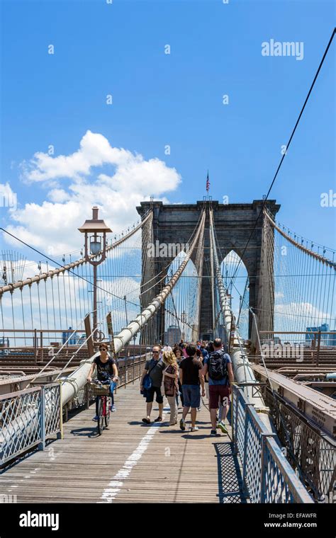 Brooklyn Bridge. Pedestrians on Brooklyn Bridge Pedestrian Walkway looking towards Brooklyn, New ...