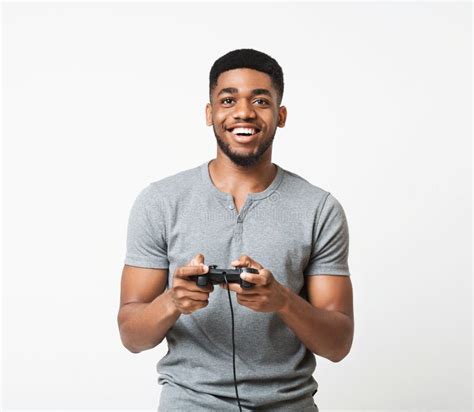 Happy Black Guy Holding Joystick and Playing Video Games Stock Image ...