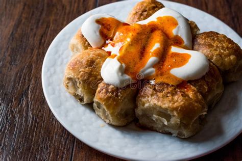 Bosnian Pastry Manti with Yogurt and Fried Butter Sauce / Bosnak Borek Stock Image - Image of ...