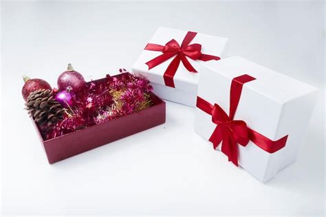 Premium Photo | Gift box with christmas ornament