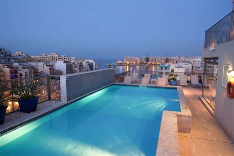 Hotel Juliani - Malta Housed in a graciously... | Rooftop pool, Malta house, Hotel landscape