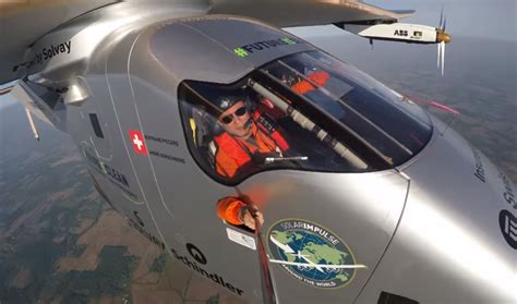 Watch: Solar Impulse Pilot Takes Selfie From Outside Cockpit - Newsweek