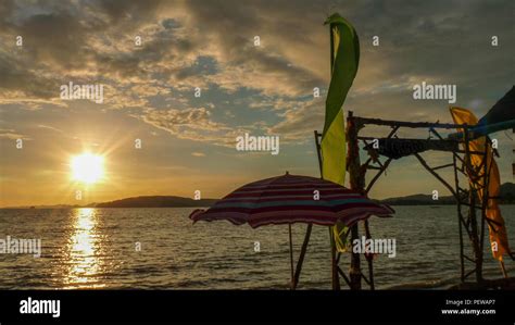 Landscape view of a sunset over the Krabi beach, with colorful ...