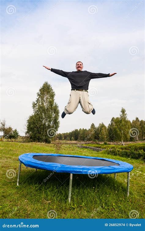 Man Jumping On The Trampoline Stock Images - Image: 26852974