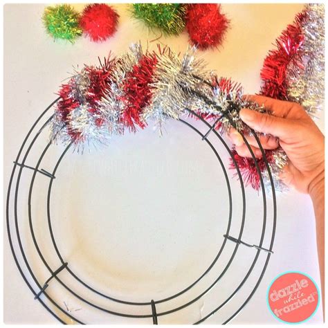 Wrap a wreath form with tinsel garland for a DIY Retro Tinsel Garland Christmas Wreath | Tinsel ...