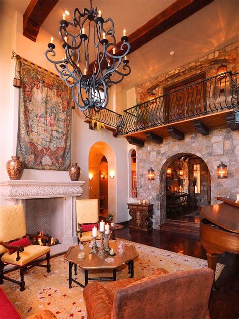 The wrought-iron detailing is brought into the room through an oversized chandelier and balcony ...