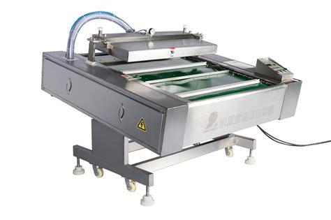 Belt conveyor type vacuum packaging machine - Vacuum Packaging Machine ...