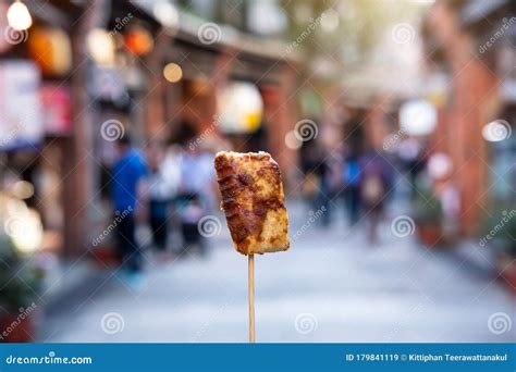 Young Woman Traveler Walking Holding Stinky Tofu at Taiwanese Street ...