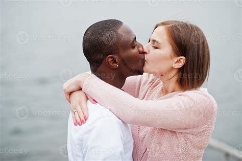 Happy multiethnic couple in love story. Relationships of african man ...