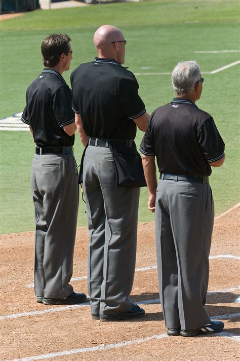 Standing during national anthem | Third base umpire Steve Fr… | Flickr