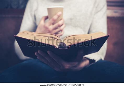 Young Man Sitting On Sofa Reading Stock Photo 189290039 | Shutterstock