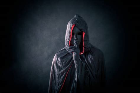 Best Dark Hooded Figure Stock Photos, Pictures & Royalty-Free Images - iStock