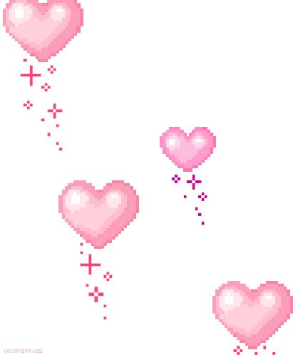 some pink heart shaped balloons floating in the air