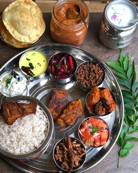 Lunch Special Kerala Thali Meal Rice with fish fry, yellow cucumber ...