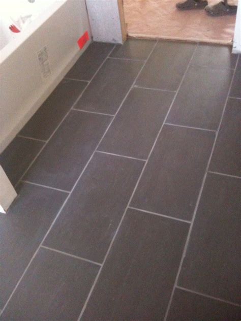 Master bathroom floor tiles. | Needs one more wash down and … | Flickr