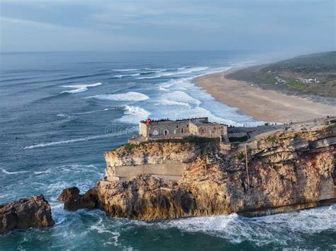 Lighthouse in Nazare, Portugal. Famous Place for Waves and Surfing Stock Photo - Image of beauty ...