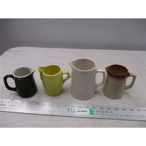 (4) Medalta Pottery Pitchers