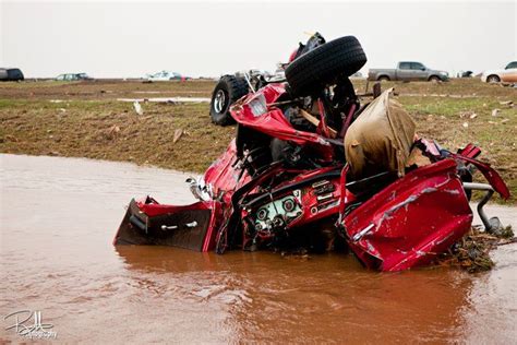 whoa! this car is twisted beyond recognition! I can't even tell what kind it is! Tornadoes ...