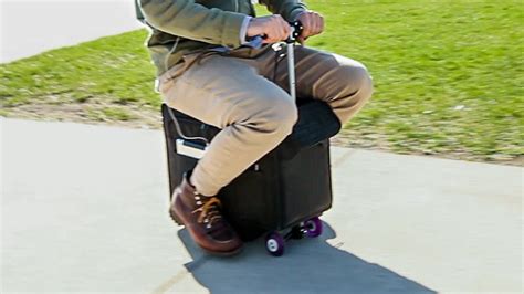 This Electric Scooter Suitcase Is the Lazy Traveling Man's Dream Bag | GQ