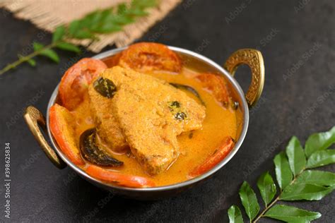 Kerala fish curry coconut milk gravy , cooking spicy Goan fish curry ...