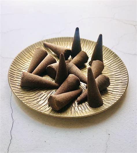 Hand dipped incense cones with a highly scented patchouli scent with real essential oils, which ...