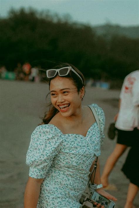 Cheerful Laughing Woman at Beach · Free Stock Photo