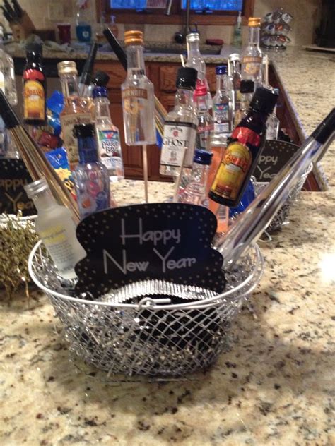 a basket filled with lots of bottles on top of a counter