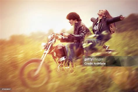 Young Couple In Sunset High-Res Stock Photo - Getty Images