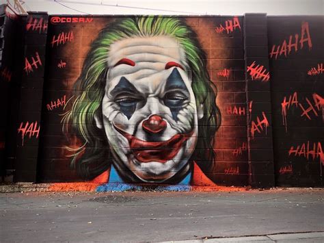 A gorgeous graffiti street art Joker Joaquin Phoenix from Joker Movie mural by cosa.v on ...