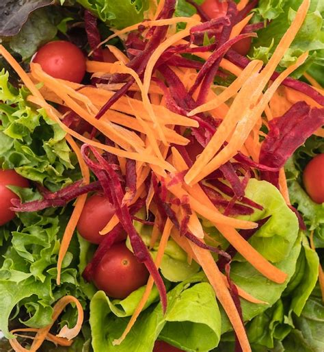 Free Photo | Mixed salad in wood bowl