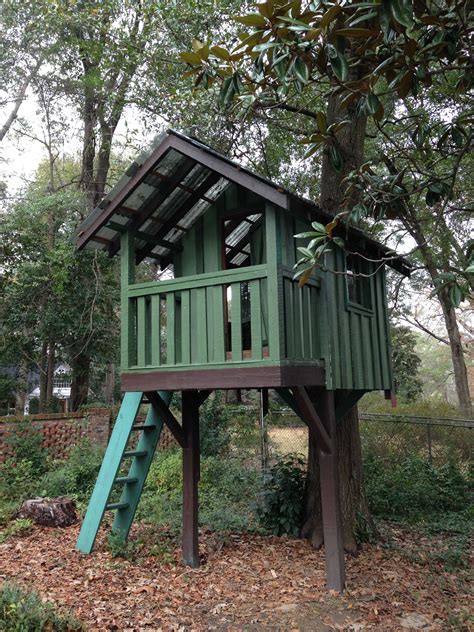 Kids tree house we built from salvaged wood. | Tree house kids, Tree house, Cool tree houses