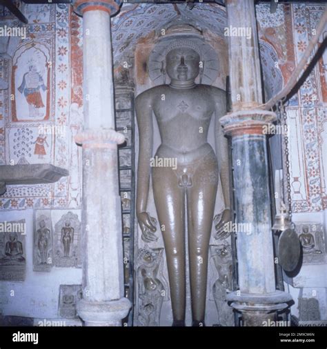 Statue of a Jain god, or Tirthankar, in the Sri Adinath Temple at Khajuraho Stock Photo - Alamy