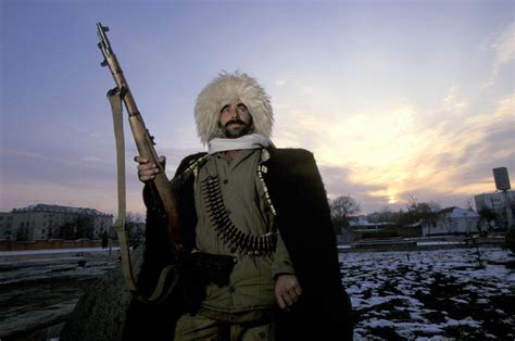 A Chechen fighter in traditional clothing, 1994. [1200 x 796] : r ...