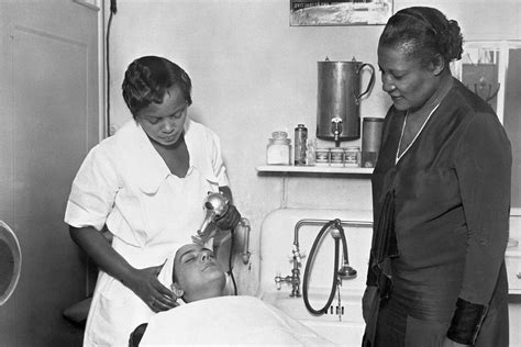 A'Lelia Walker, daughter of entrepreneur Madam C.J. Walker, supervises a facial in one of her ...