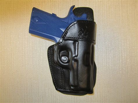 ITEM # 266 - KIMBER ULTRA CARRYll & COLT DEFENDER , LEATHER OWB PADDLE ...