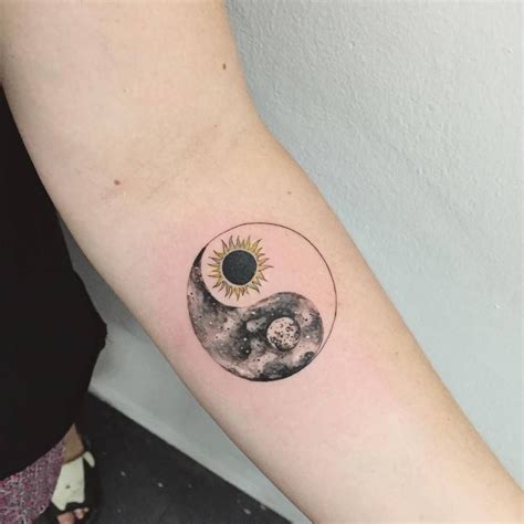 Stunning Sun-Moon Yin Yang Forearm Tattoo