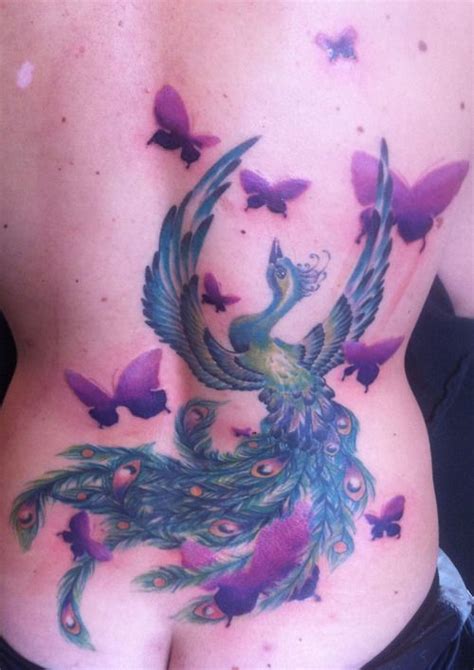 Blue phoenix tattoo with purple butterflies