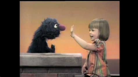 Sesame Street - Muppet & Kid Moment — Grover and Polly count five ...