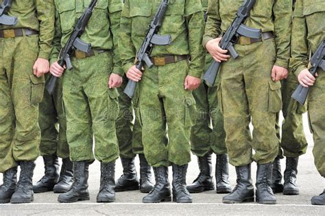 Formation Of Soldiers With Guns Stock Photo - Image of kalashnikov, camouflage: 19993486