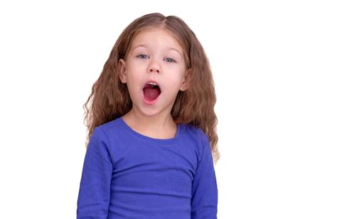 Premium Photo | Singing child kid with wide open mouth isolated on white background looking at ...