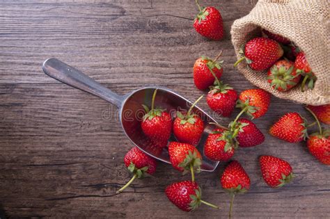 Fresh Strawberry in Metal Ladle on Wood Table, Top View Image. Stock Photo - Image of healthy ...
