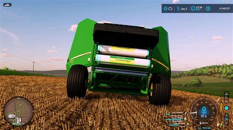 John Deere 560M with Net Wrap Addon v1.0 FS22 Mod | Farming Simulator 22 Mod