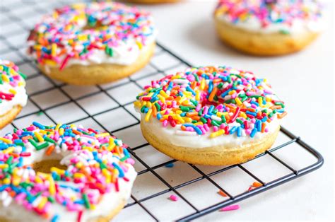 Vanilla Frosted Doughnuts With Sprinkles