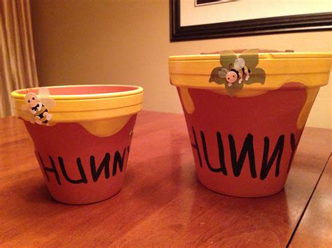 Hunny Pots: terra cotta pots, outdoor acrylic paint, and bumblebee stickers from Michael's ...