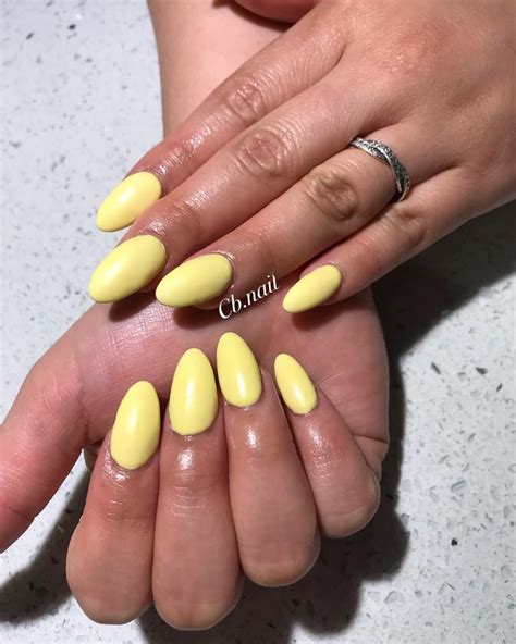 Yellow nails, pastel nails, pastel yellow nails, almond nails, acrylic ...