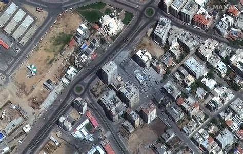 Satellite photos show leveled buildings and plumes of smoke in Gaza ...