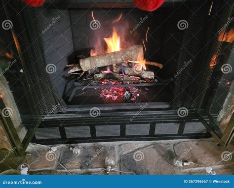 Stack of Wood Burning in the Fireplace at Home Stock Image - Image of fire, coal: 267296667